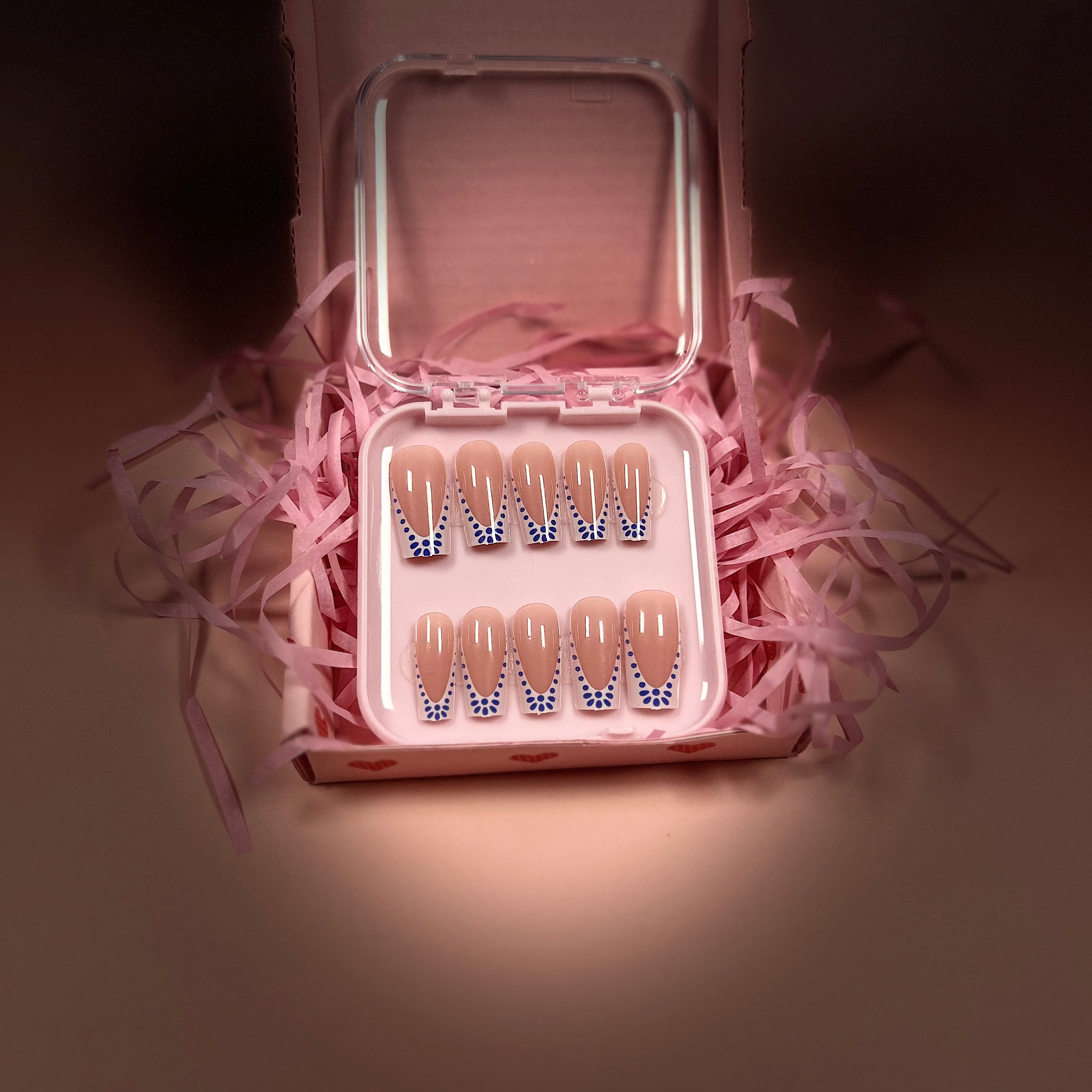 Elegant French tip with blue dots accent