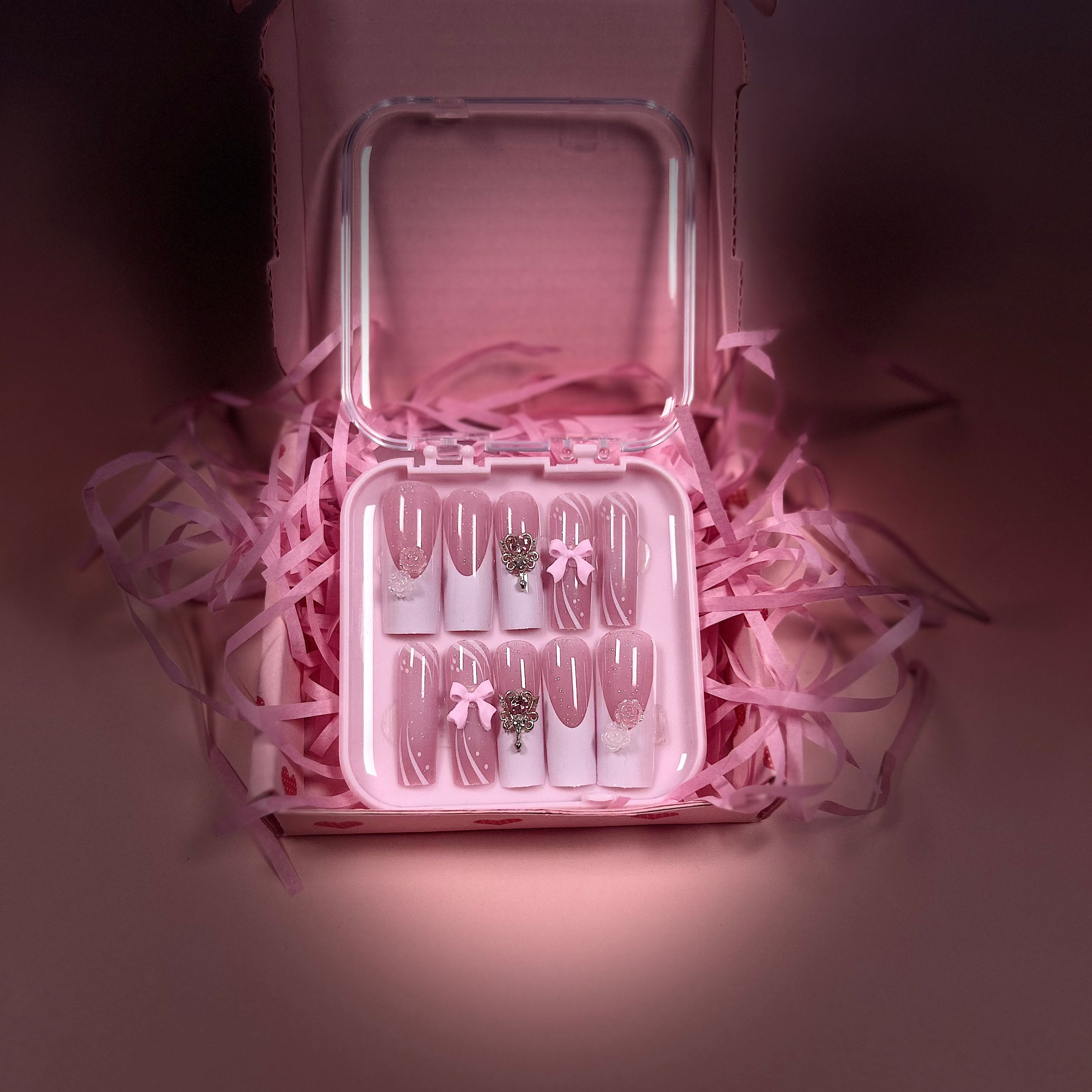 Glossy blush French tip with charms